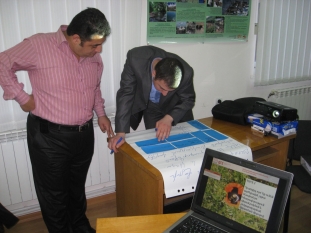 Vahe Mambreyan and Narek Sahakyan are compiling data collected from communities